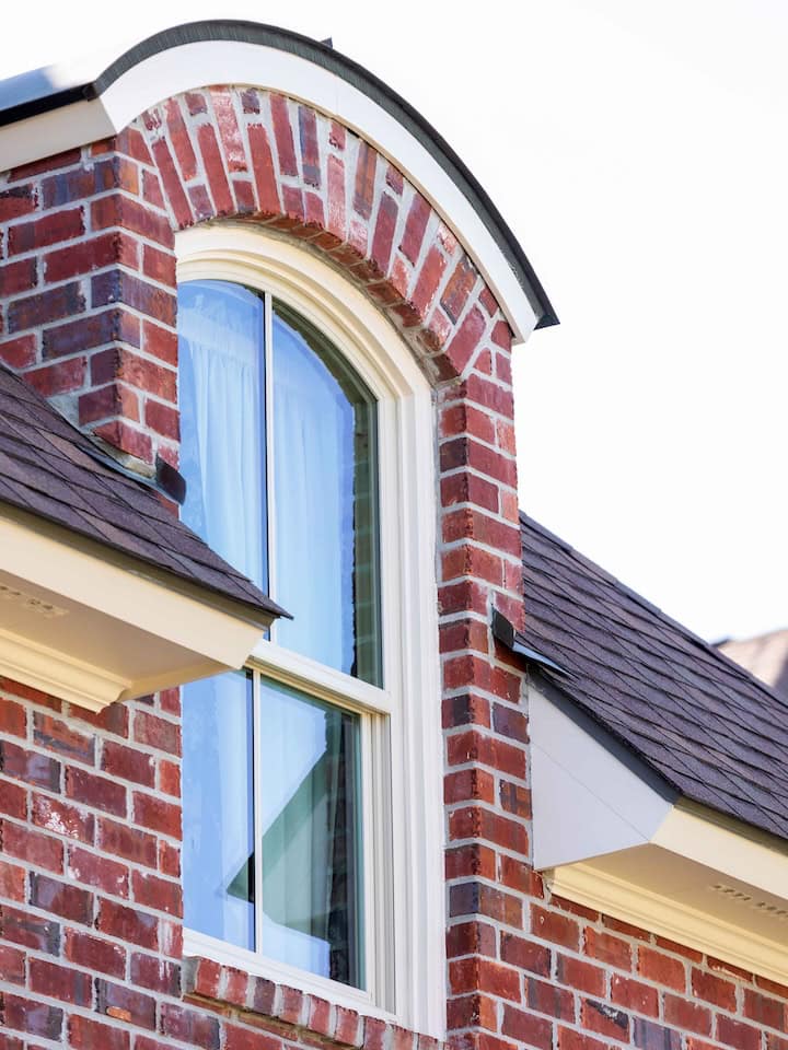 Geo-hung window on a red brick house