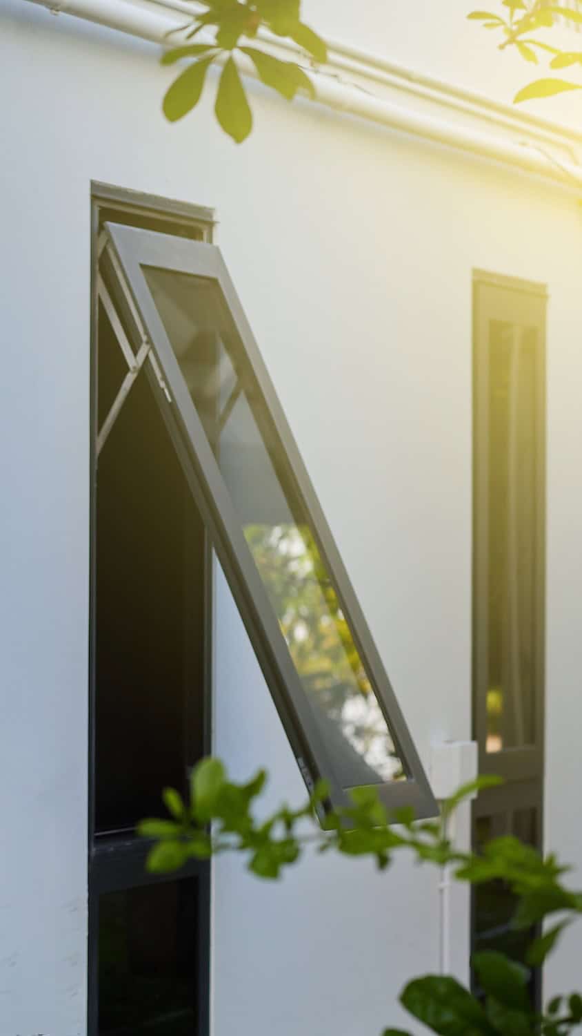 Black frame aluminium casement windows on building